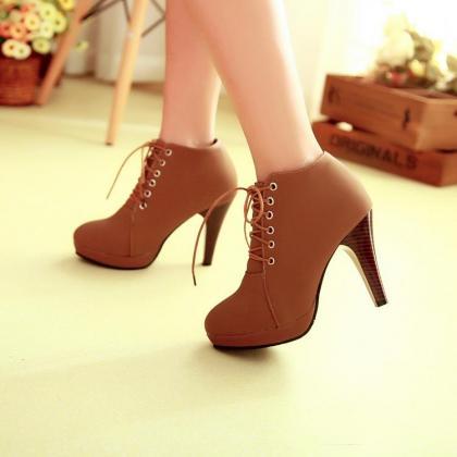 brown heeled lace up boots